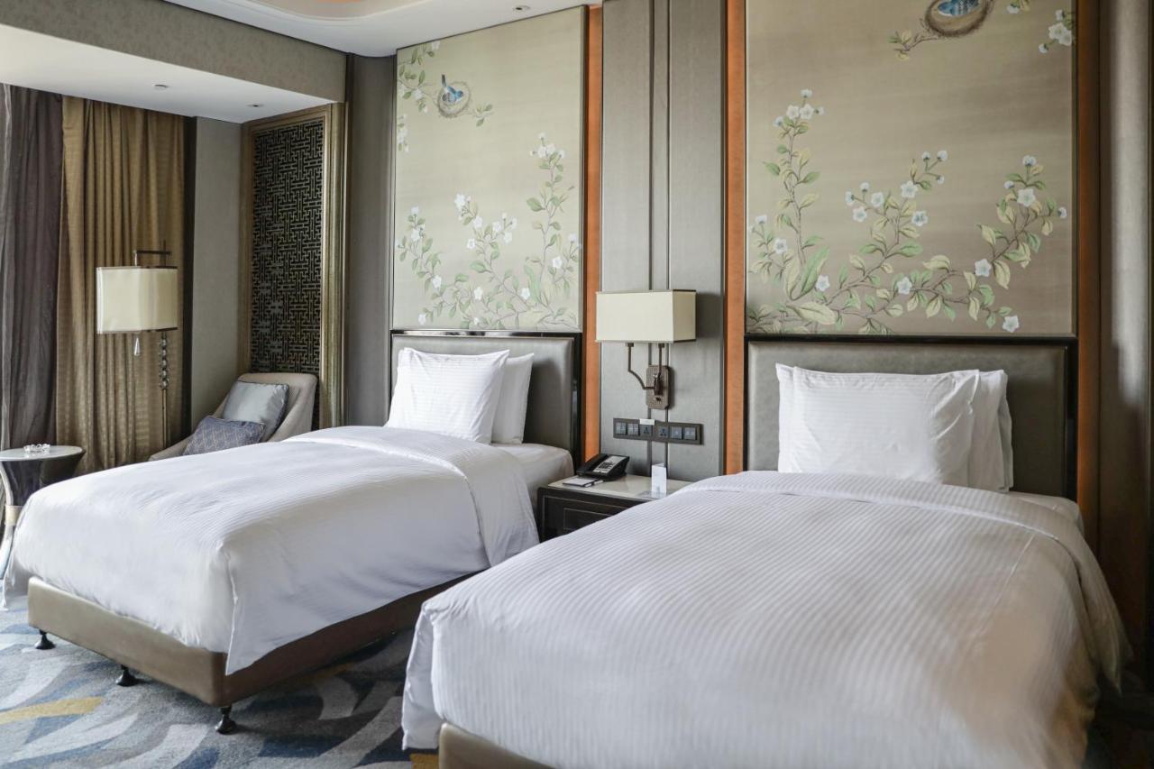 Wanda Vista Zhengzhou Hotel Exterior foto