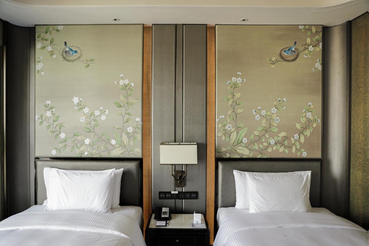 Wanda Vista Zhengzhou Hotel Exterior foto